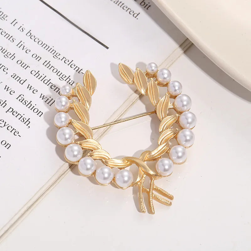 Pearl Ribbon Brooches